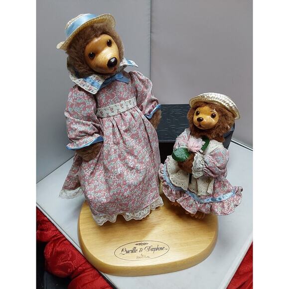 Robert Raikes wood face Bears Lucille & Daphne on wooden display stand
